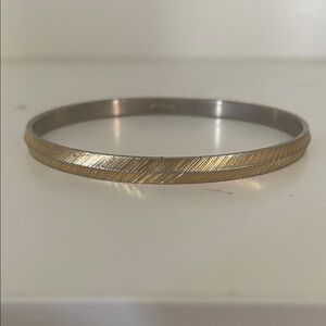 Gold and Silver Bangle Bracelet Monet gold toned etched bangle bracelet.